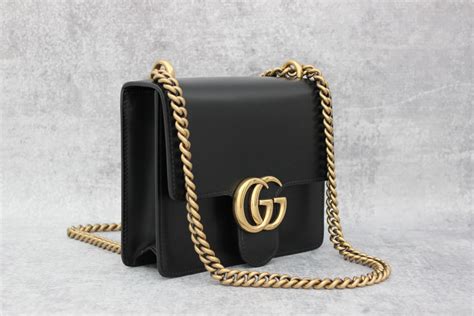 black gucci purse gold chain|Gucci purse shoulder strap.